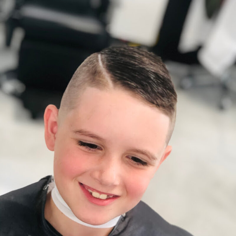 Kids haircut result, smiling client